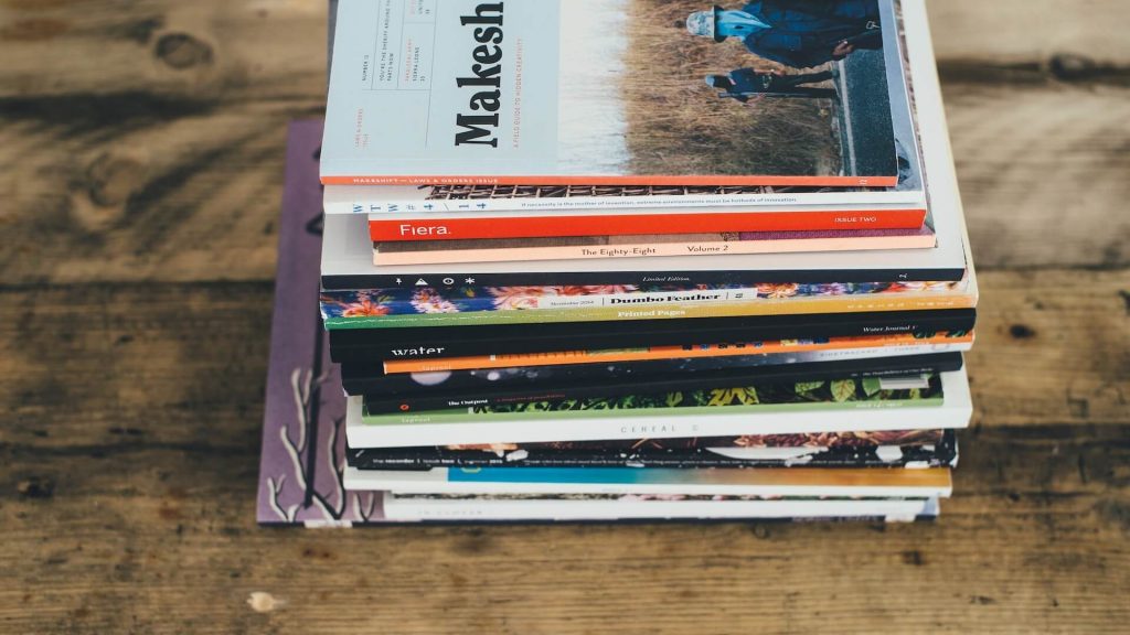 A pile of vintage magazines
